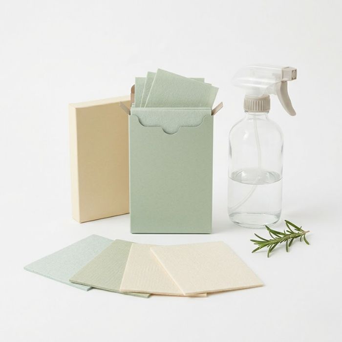 Kitchen spray refill sheets with a reusable spray bottle